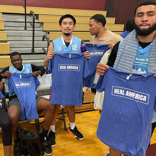 Midnight Basketball - Guys Holding Up Heal America T-shirts